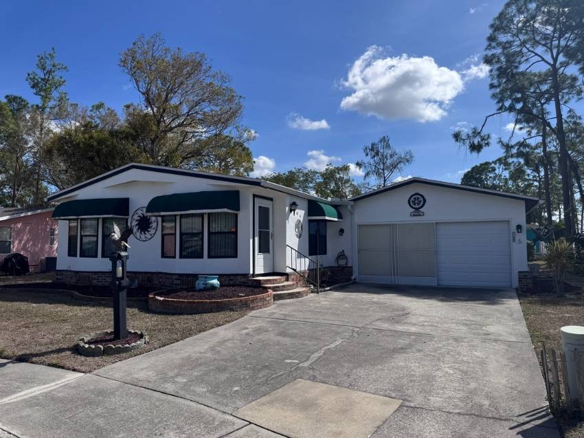 North Fort Myers, FL Mobile Home for Sale located at 2909 Madera Circle Del Tura Golf & Country Club